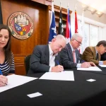 Signature de l'avenant à la convention entre le CODOFIL, l'Université de Louisiane à Lafayette, la Fondation Louisiane, l'Université de Namur, le Commissariat aux Relations Internationales de la Ville de Namur et l'asbl Namur-Lafayette, en 2022 à Lafayette